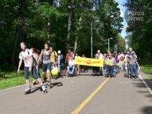 На Олимпийской аллее 100 инвалидов  области устроили массовый заезд﻿